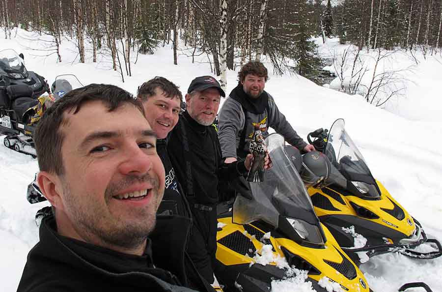 Roman Shtefan, Igor Zapivalov, Dan Gould and Evgeniy Borodin snowmobile in Russia