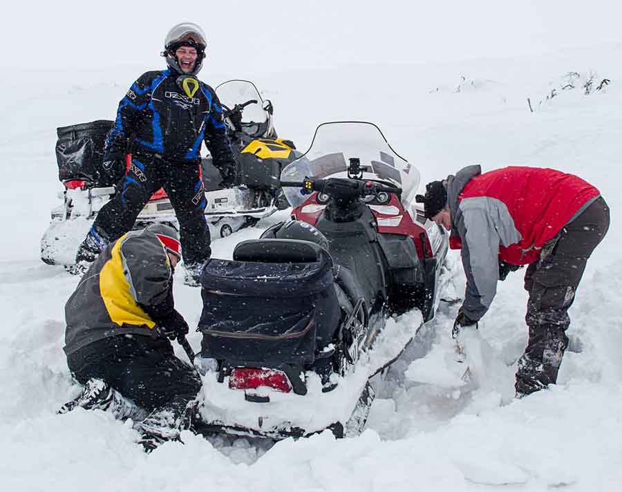 Stuck snowmobile in Russia