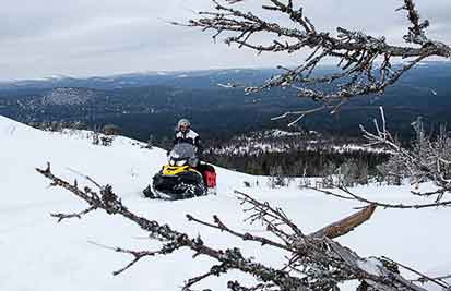 Evgeniy Borodin snowmobiles in the Urals