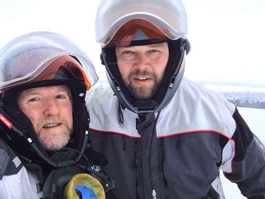Dan Gould and Evgeniy Borodin on their snowmobile adventure in Russia.