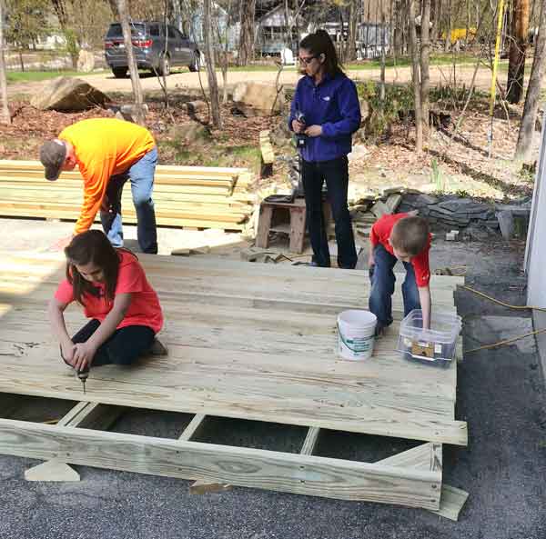 Camp Sno-Mo tent decks constructed by volunteers