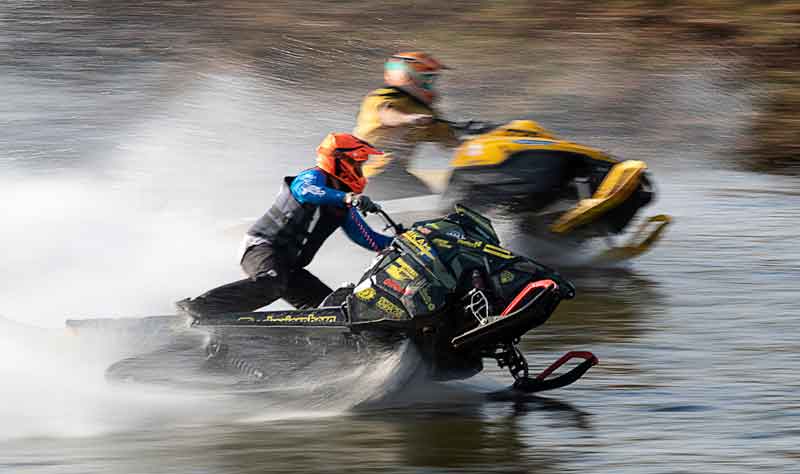 Snowmobile watercross completion in NH