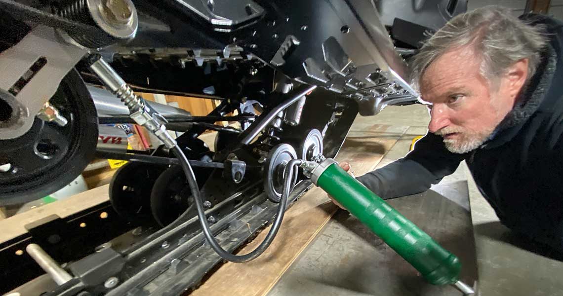 Greasing upgraded Snowmobile Suspension With Grease Fittings Zerks