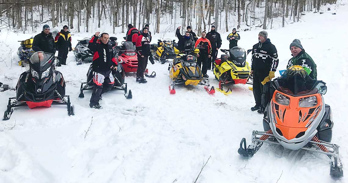 Fort Mountain NH snowmobile club volunteers ride