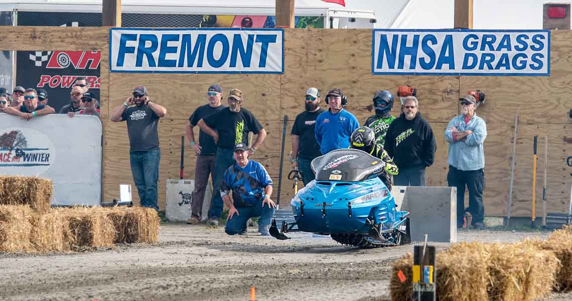 Snowmobile grass drag launches from startling in NH
