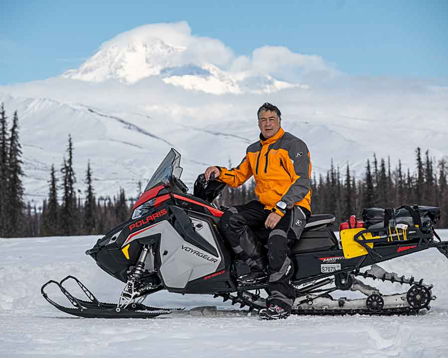 Kim Bergeron Alaska snowmobiler tour guide at Denali Mountain.