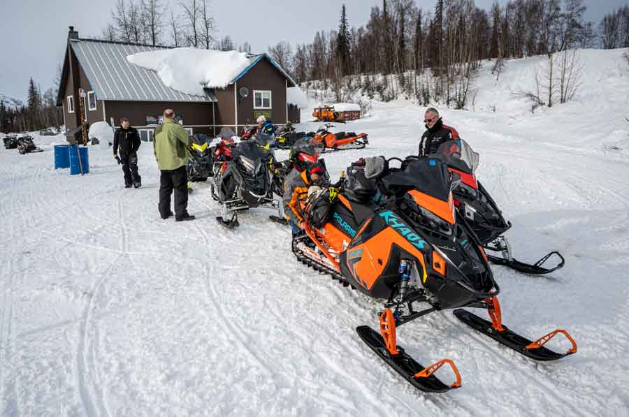 Snowmobiles at Forks Roadhouse in Petersville, Alaska